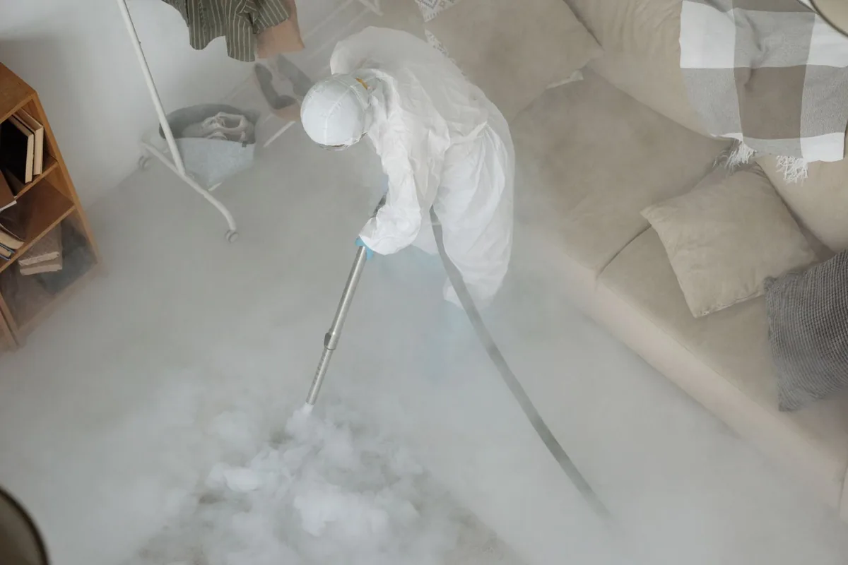 Biohazard cleanup technician in protective equipment, Edinburg, VA